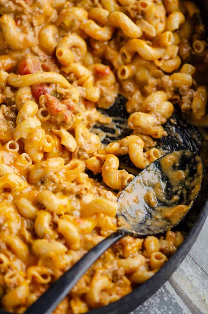 Pressure Cooker Taco Mac and Cheese scooped out to serve