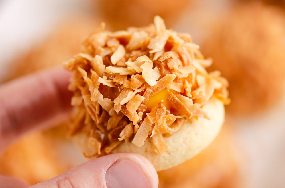 sugar cookie topped with caramel and toasted coconut