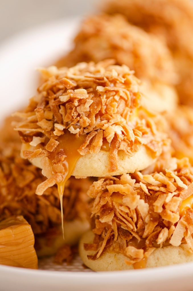 caramel dripping from toasted coconut sugar cookies