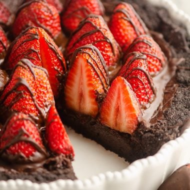 Chocolate Covered Strawberry Ganache Tart with slice removed