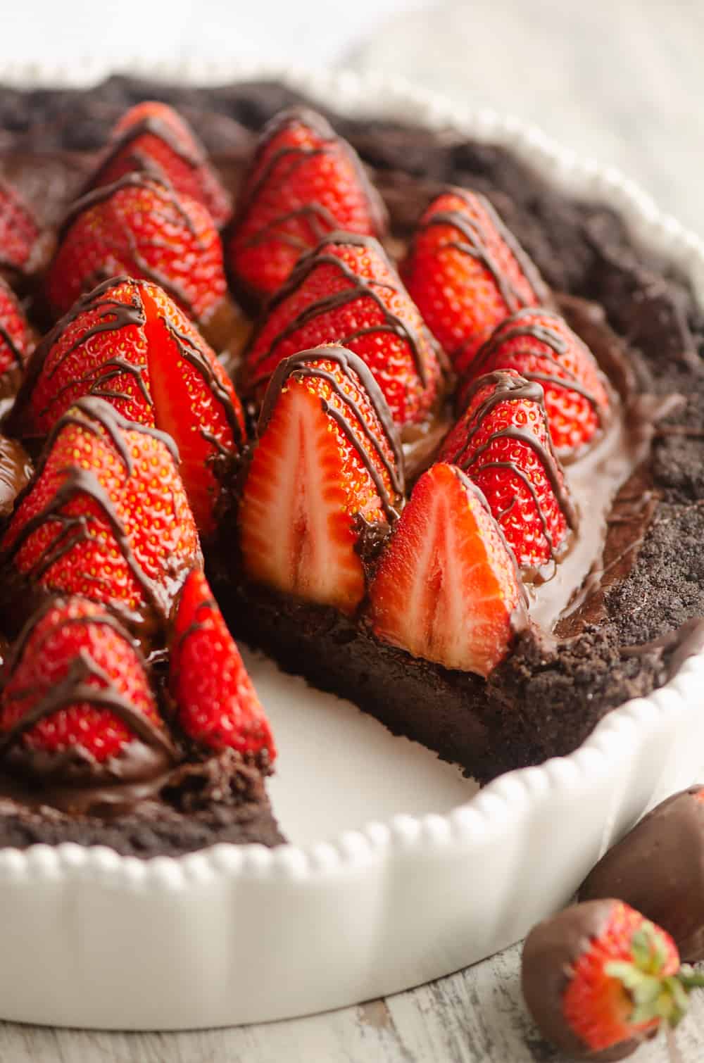 Chocolate Covered Strawberry Ganache Tart with slice removed