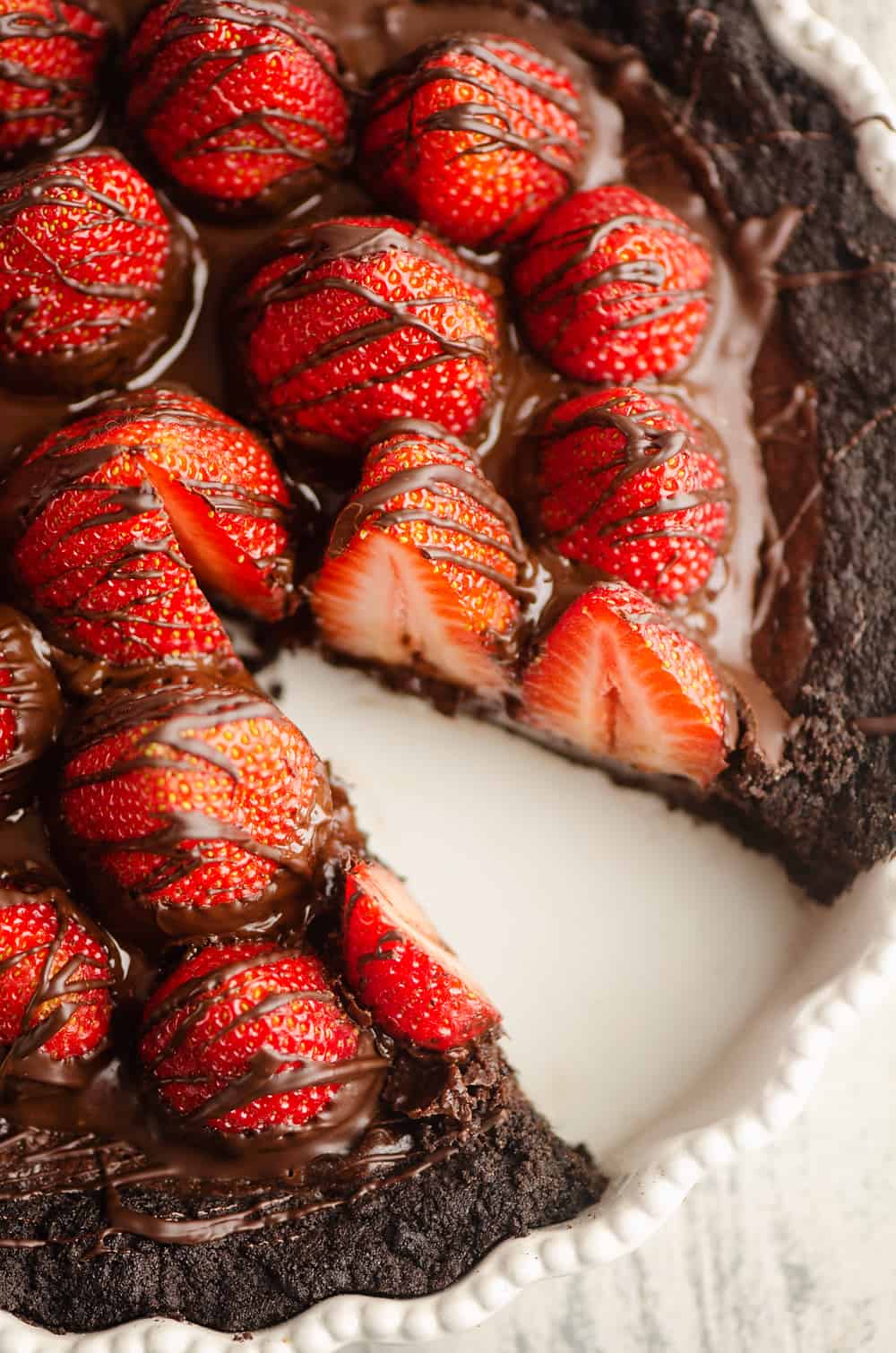 Chocolate Covered Strawberry Ganache Tart with slice removed