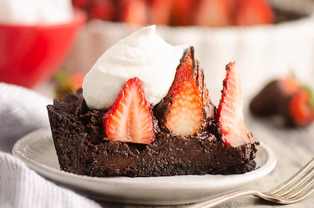 Chocolate Covered Strawberry Ganache slice of tart on plate