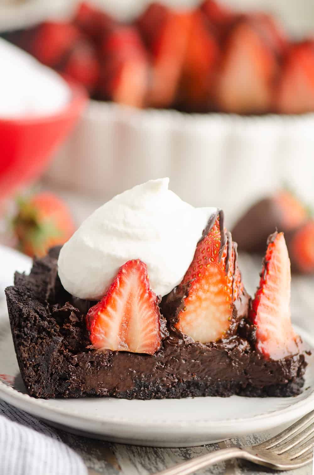 Chocolate Covered Strawberry Ganache slice of tart on plate