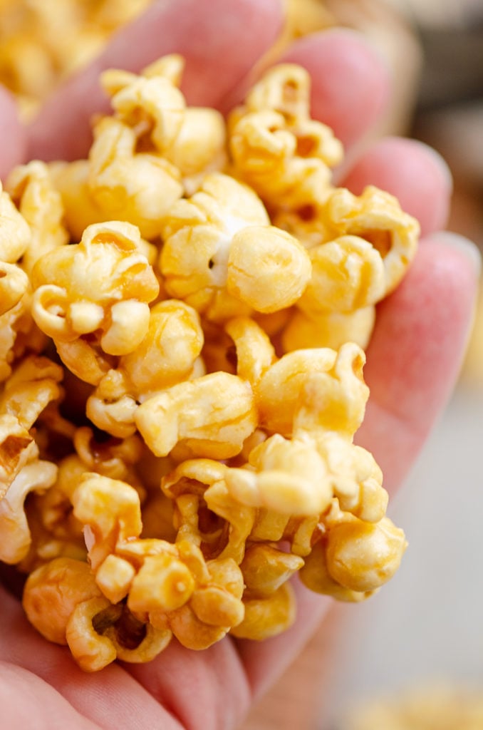 Microwave Caramel Popcorn in hand