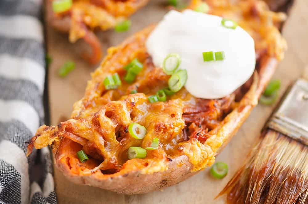 Cheesy BBQ Pork Sweet Potato Skins with sour cream