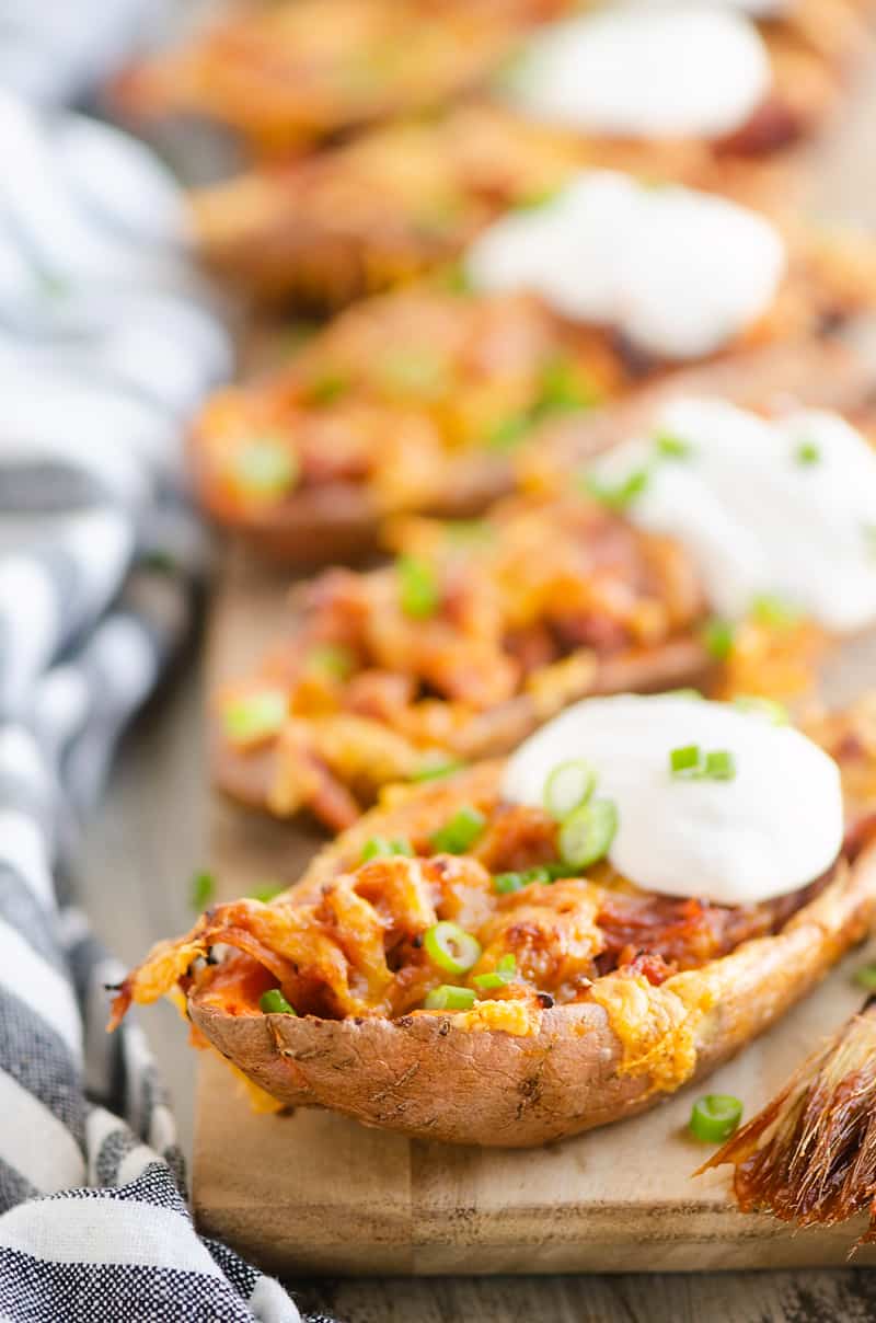 Cheesy BBQ Pork Sweet Potato Skins with sour cream