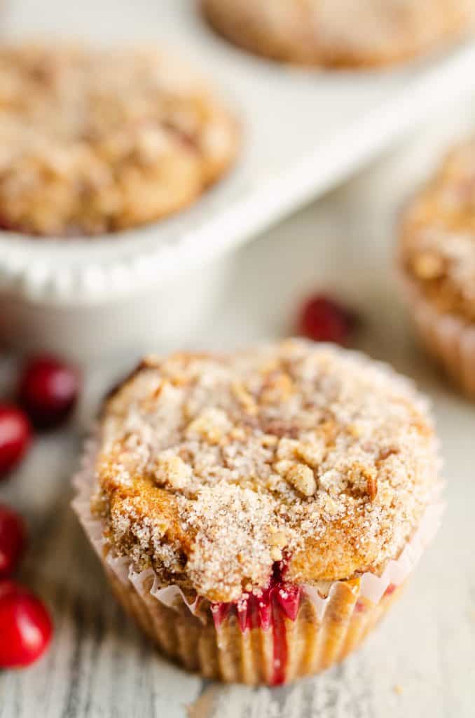 Cranberry Streusel Muffins in wrapper on table