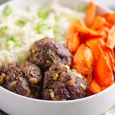 Glazed Hoisin Meatballs, carrots and rice in white bowl