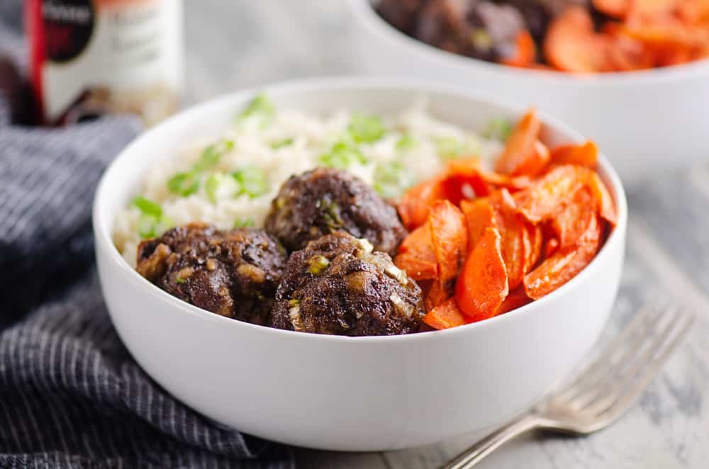 Glazed Hoisin Meatball Bowls served on table with fork