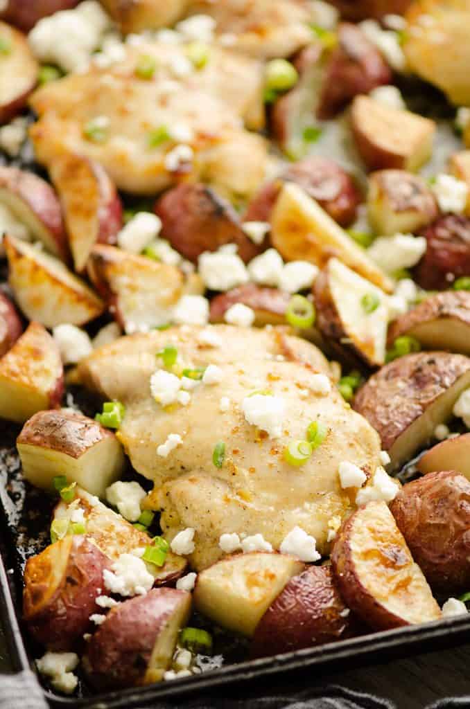 Lemon Feta Sheet Pan Chicken Thighs & Potatoes on pan