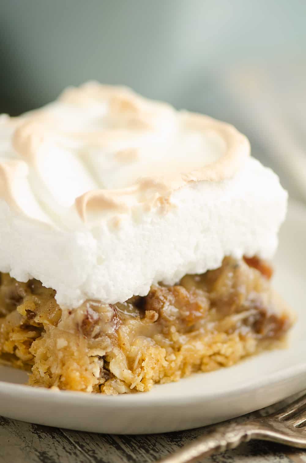 Sour Cream Raisin Meringue Bars on plate