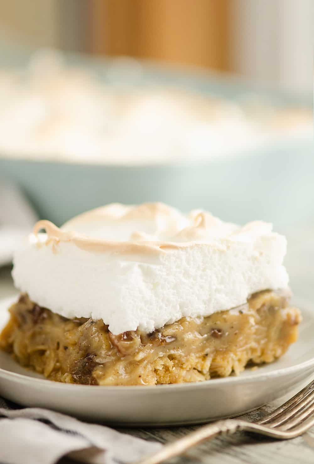 Sour Cream Raisin Meringue Bars on plate