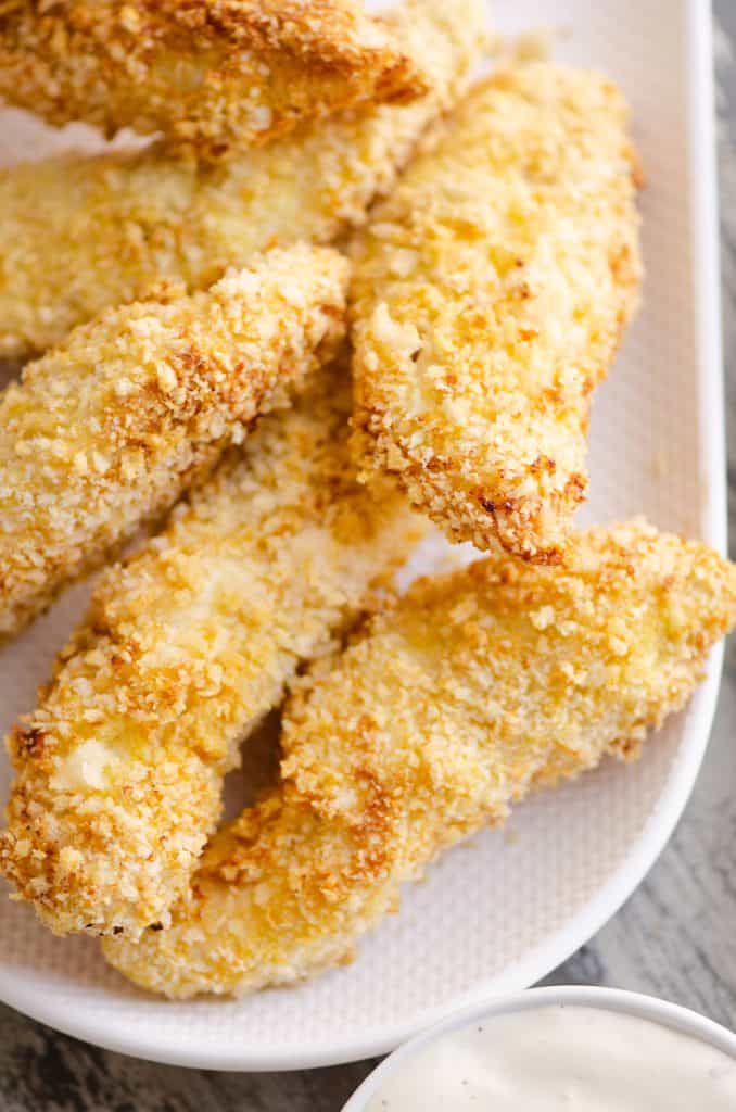 Air Fryer Chicken Strips on white serving platter