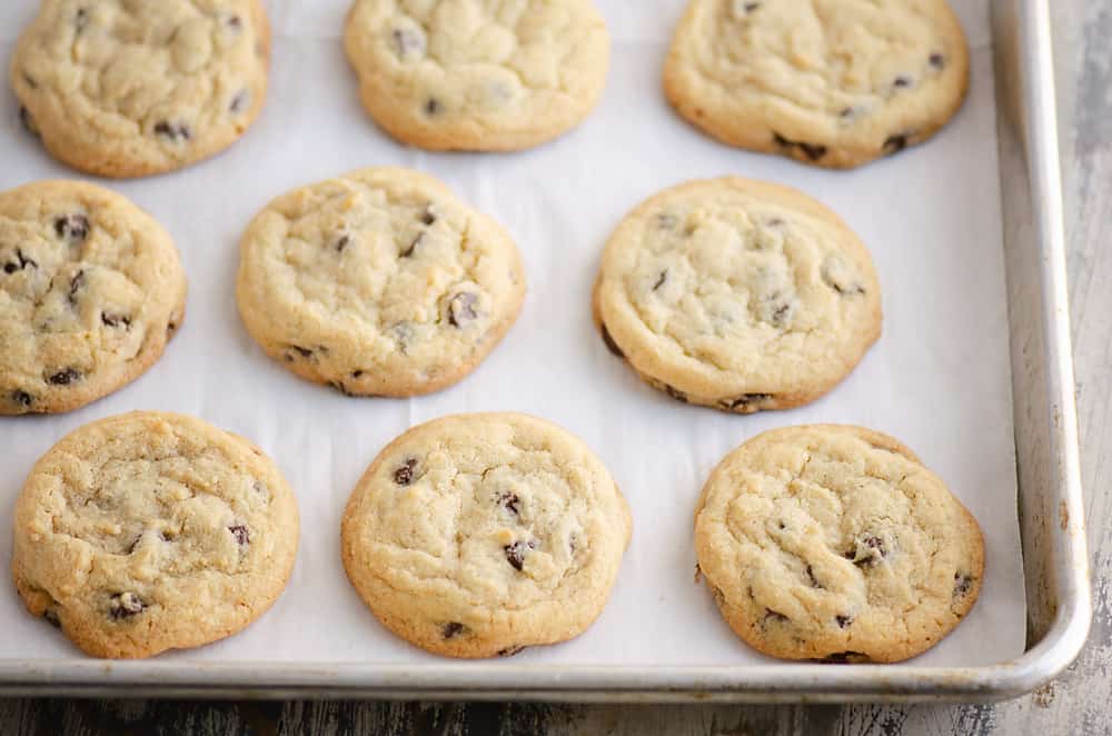Chocolate Chip Cookies on parchment paper lined baking sheet