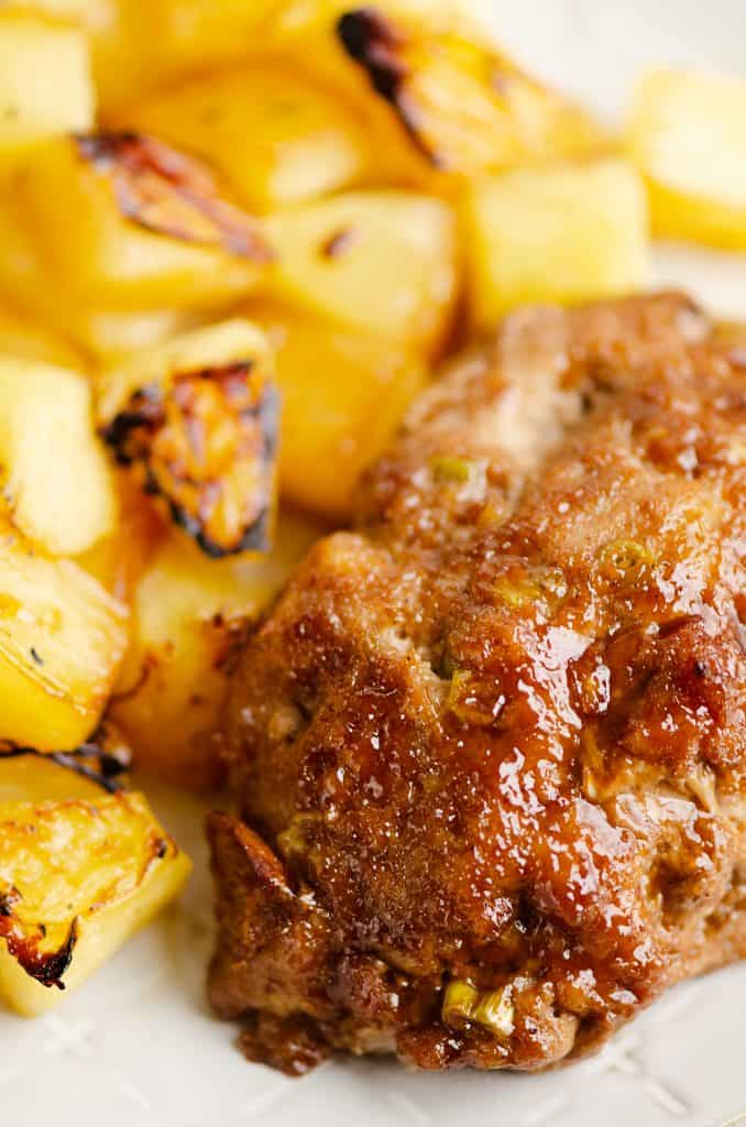 Roasted Pineapple and mini meatloaves on plate