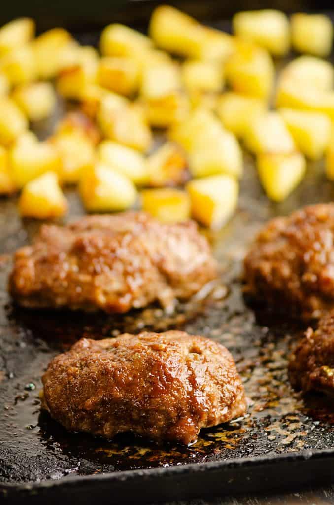 Roasted Pineapple and mini meatloaves on sheet pan