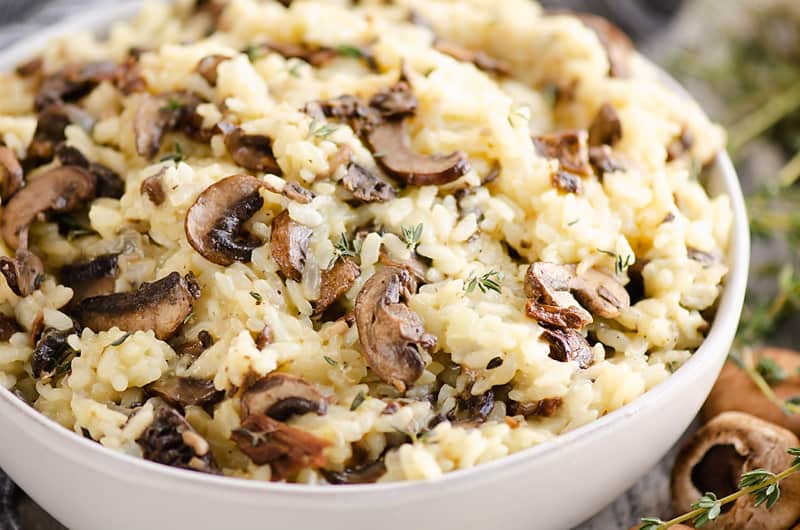 Pressure Cooker Mushroom Risotto in bowl with mushrooms and thyme