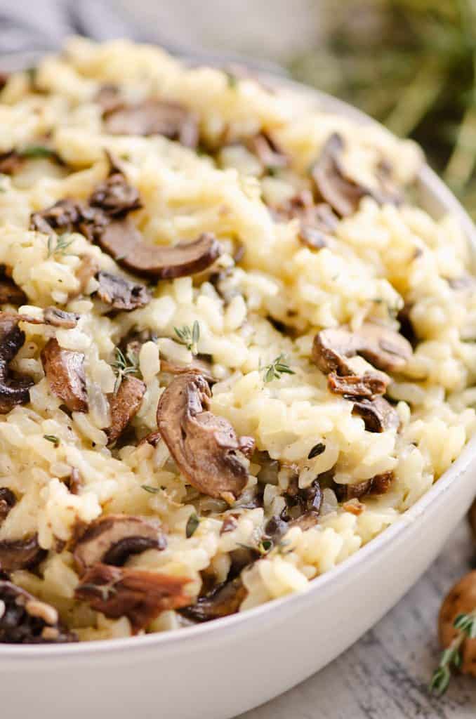 Pressure Cooker Mushroom Risotto in bowl with mushrooms and thyme