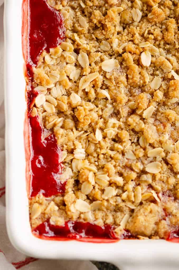 Strawberry Rhubarb Crisp Bars in white 9x13 pan