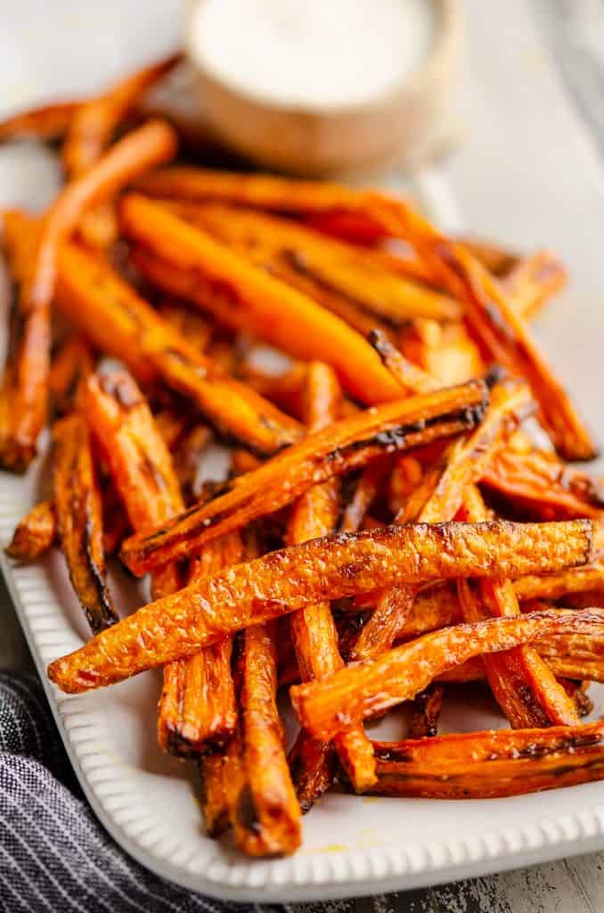 Crispy Carrot Fries on white platter served with ranch