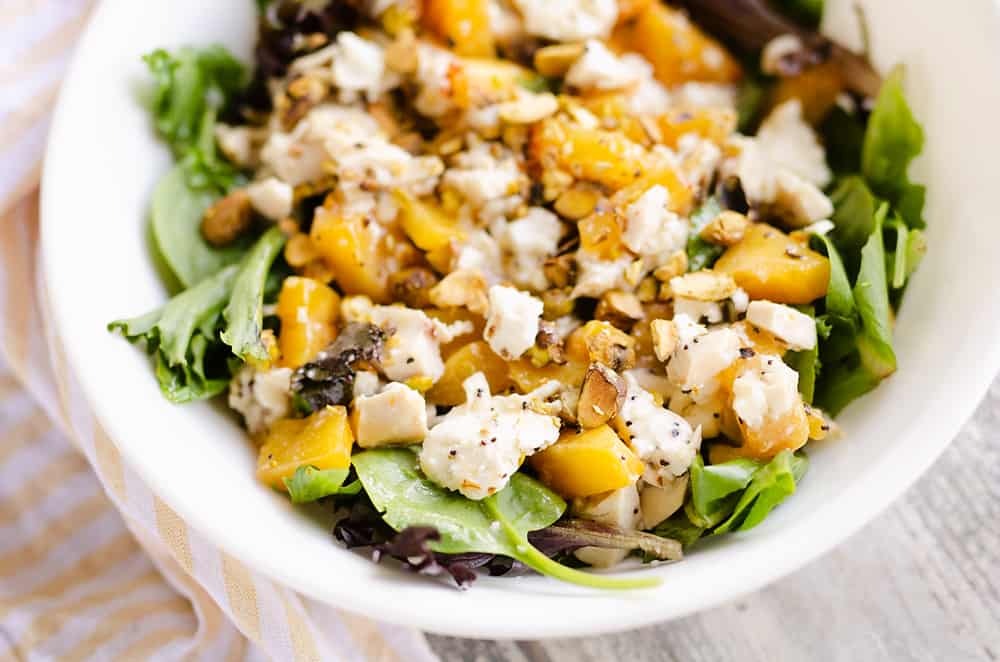 Chicken Peach Salad in a white bowl