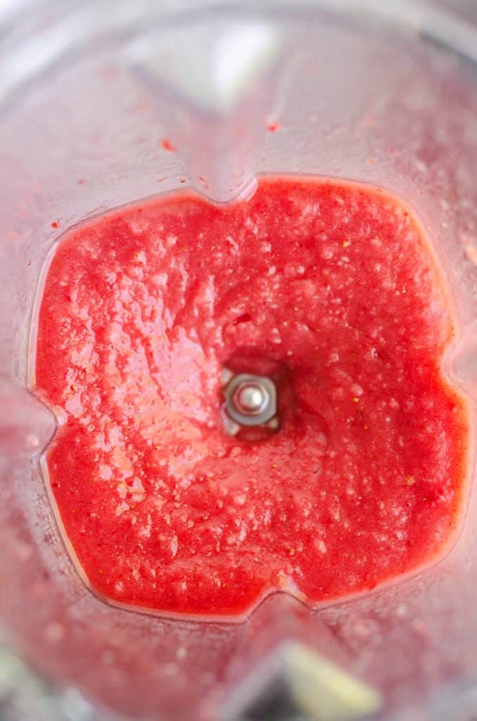 Frozen Strawberry Malibu Kombucha Cocktail inside of blender