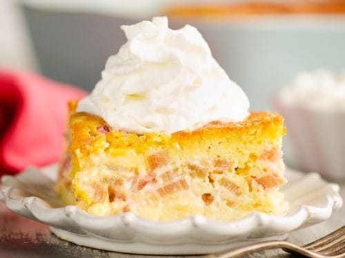 Rhubarb Custard Cake served on plate with red napkin