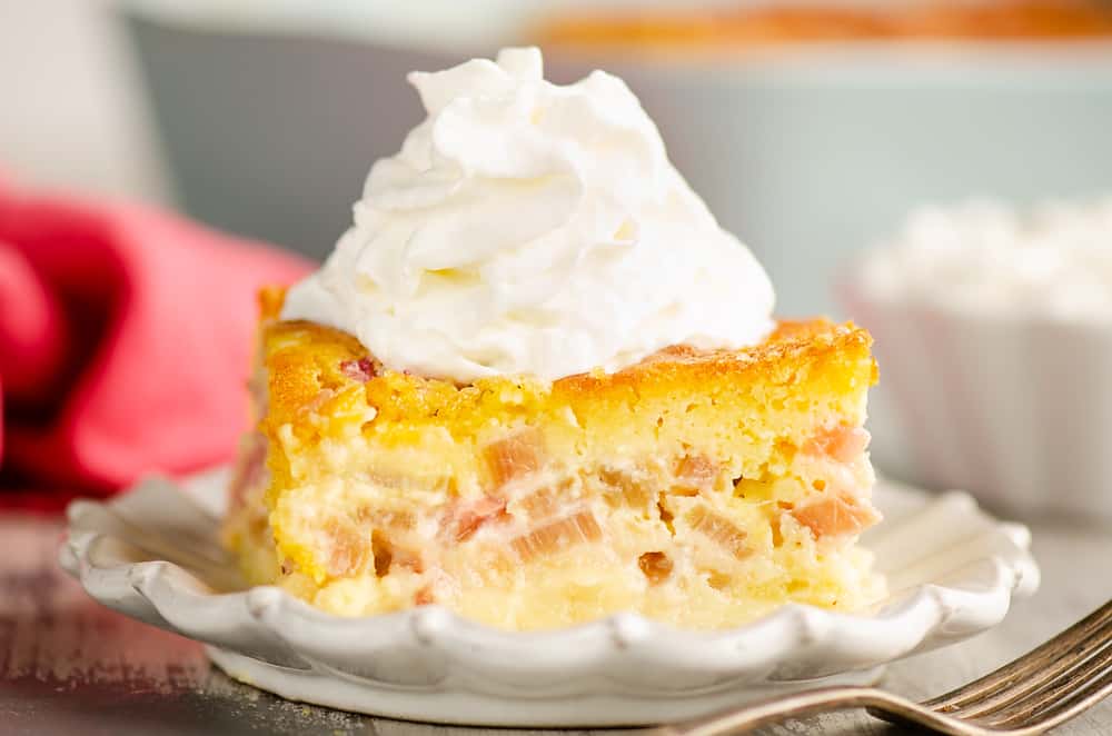 Rhubarb Custard Cake served on plate with red napkin