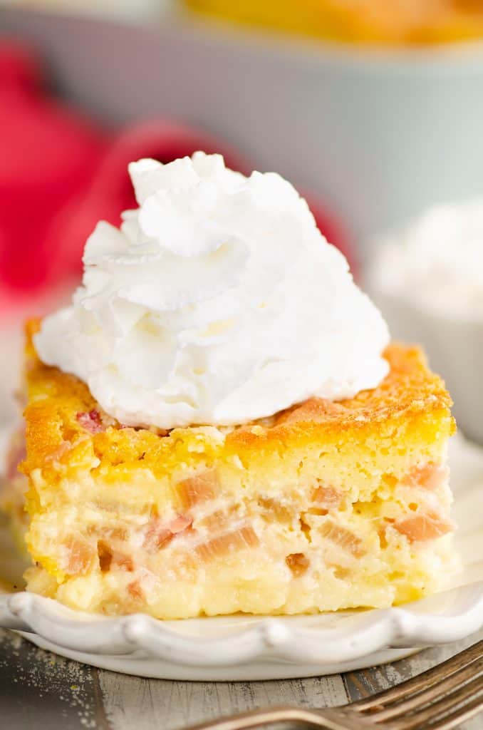 Rhubarb Custard Cake topped with cool whip