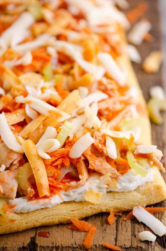 Buffalo Chicken Vegetable Pizza on wooden table