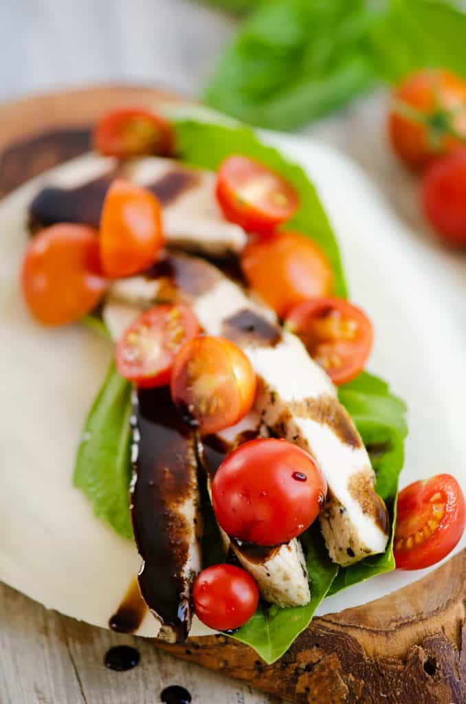 balsamic chicken, tomatoes and basil layered on mozzarella cheese wrap