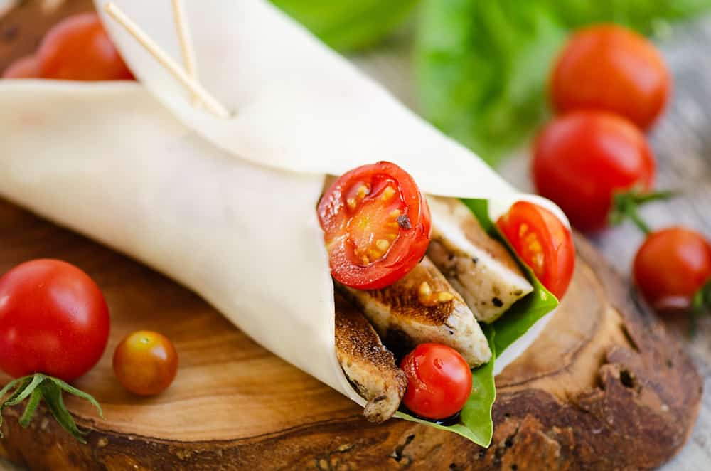 balsamic chicken, tomatoes and basil wrapped in mozzarella cheese wrap