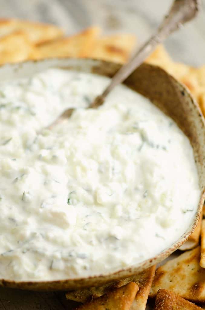 Cucumber Feta Greek Yogurt Dip with spoon in bowl