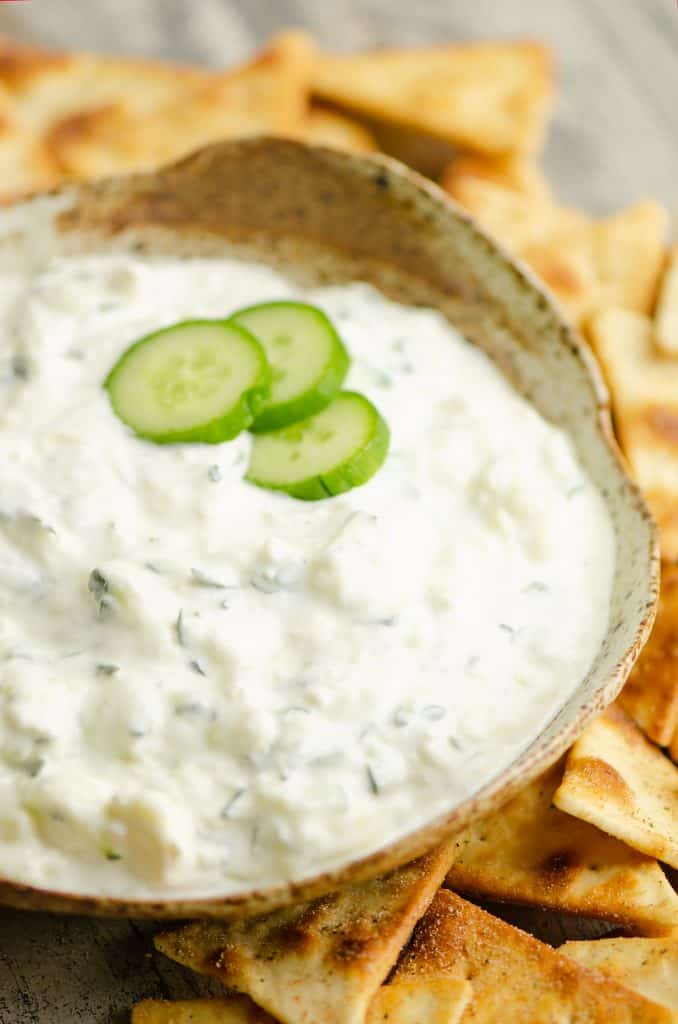 Cucumber Feta Greek Yogurt Dip in a handmade bowl with pita chips