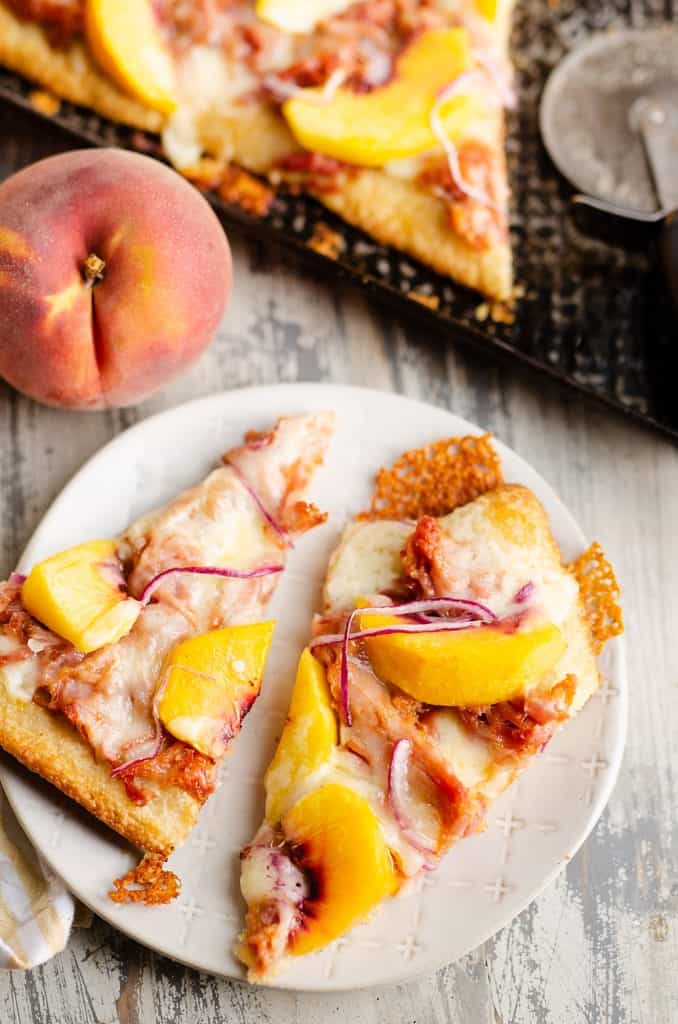 slice of BBQ Peach Pizza on white plate