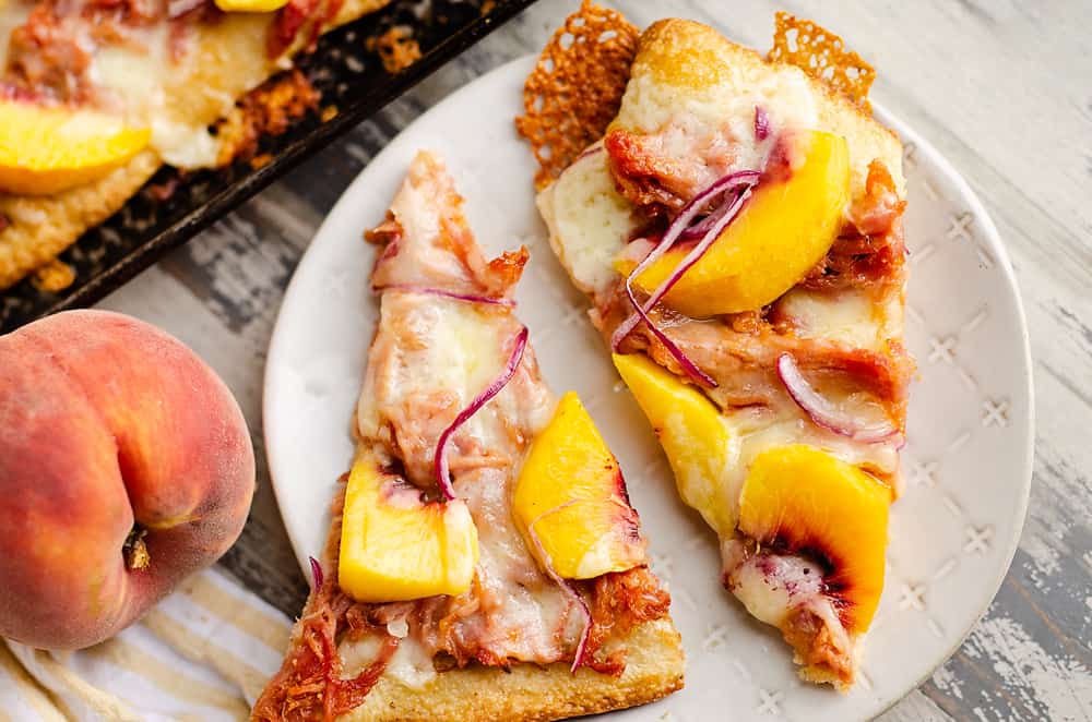 slice of BBQ Peach Pizza on white plate