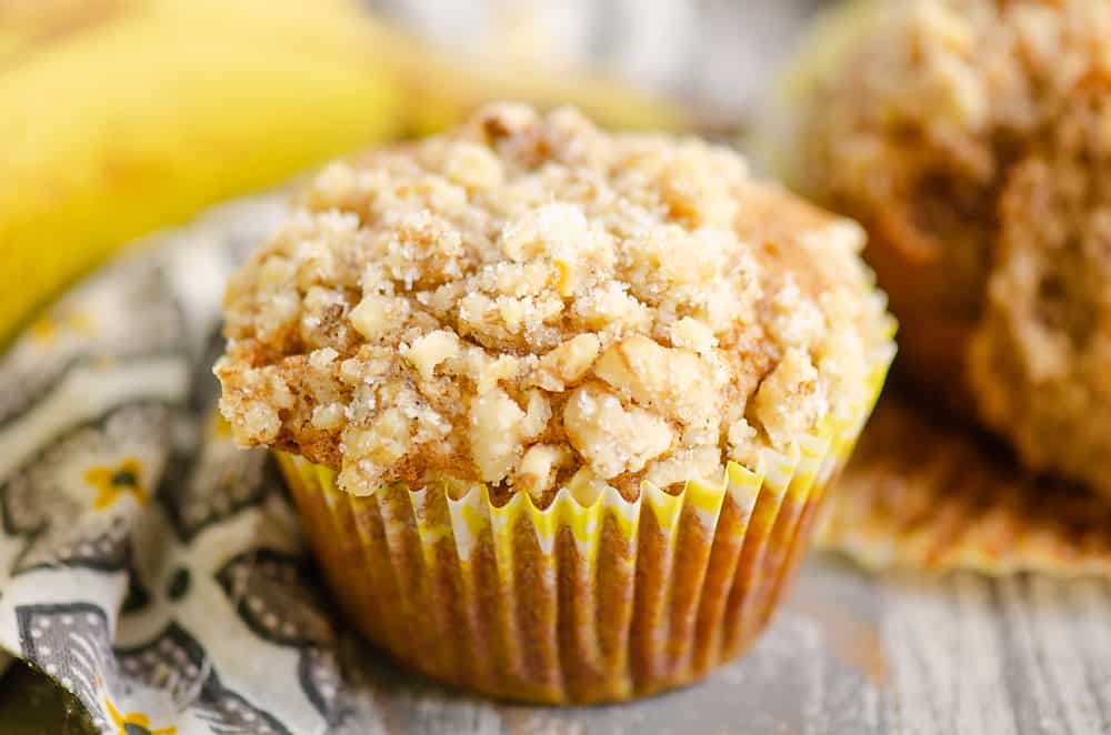 Banana Nut Muffin with Streusel Topping in yellow liner