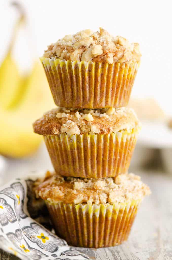 Banana Nut Muffins stacked three high on table