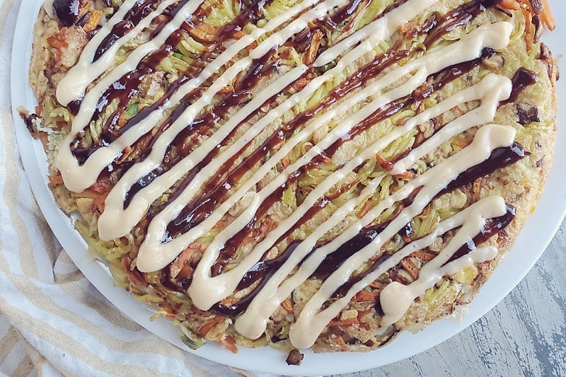 Gobble Japanese Okonomiyaki Yakisoba Noodle Omlette drizzled with sriracha mayo