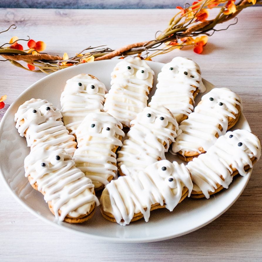 Mummy Nutter Butter Cookies on table with garland