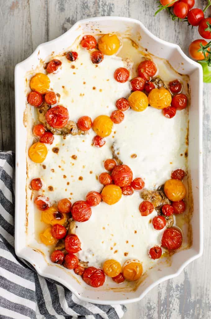 Honey Balsamic Caprese Chicken in white baking dish