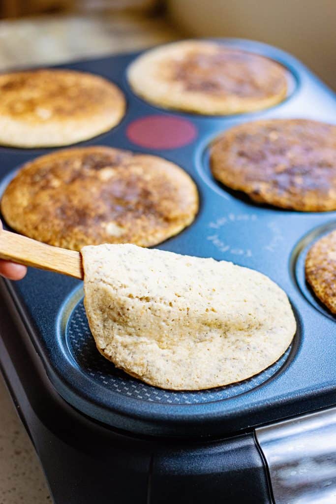 flipping Oatmeal Pancakes on griddle