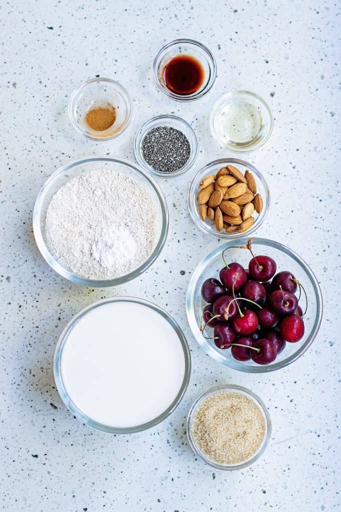 Oatmeal Pancakes ingredients in bowls on table