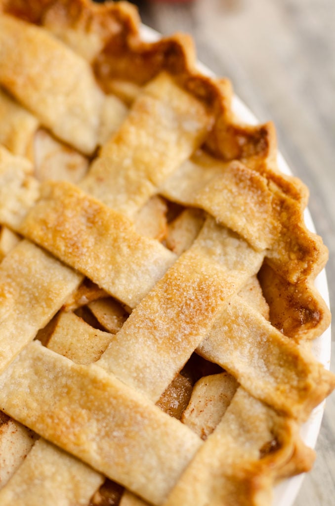 Old Fashioned Apple Pie with lattice crust in white pie plate