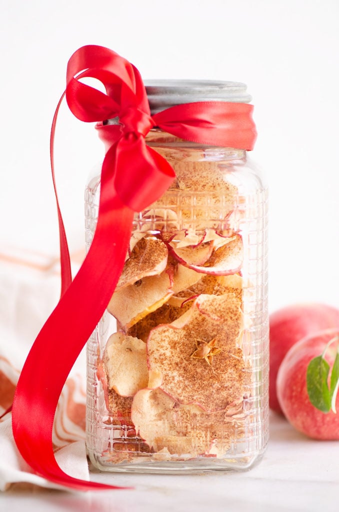 baked apple chips in mason jar with ribbon for food gift