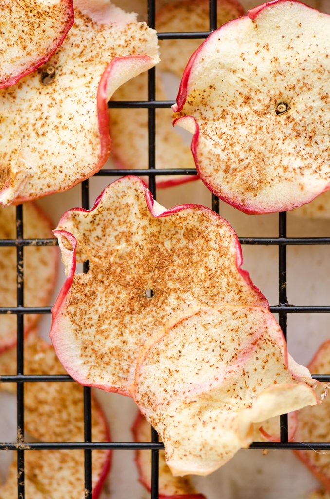 baked apple chips on cooling rack