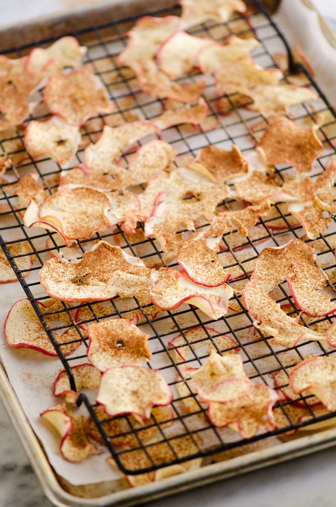 baked apple chips on cooling rack