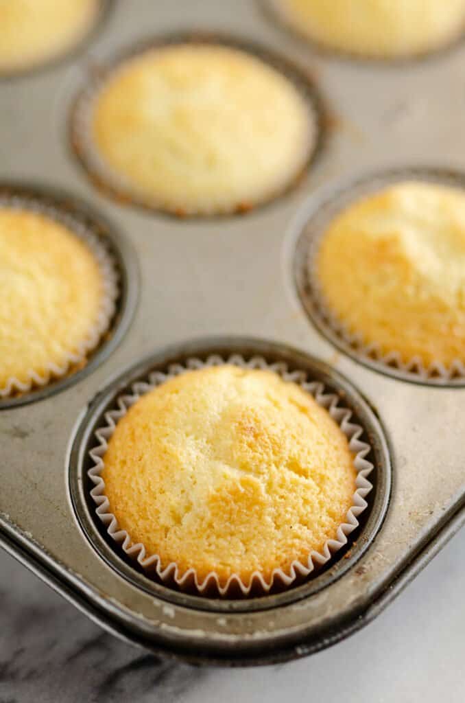 vanilla cupcakes baked in liners