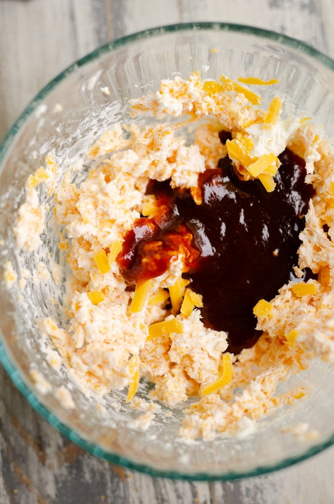 cheese and barbecue sauce in mixing bowl